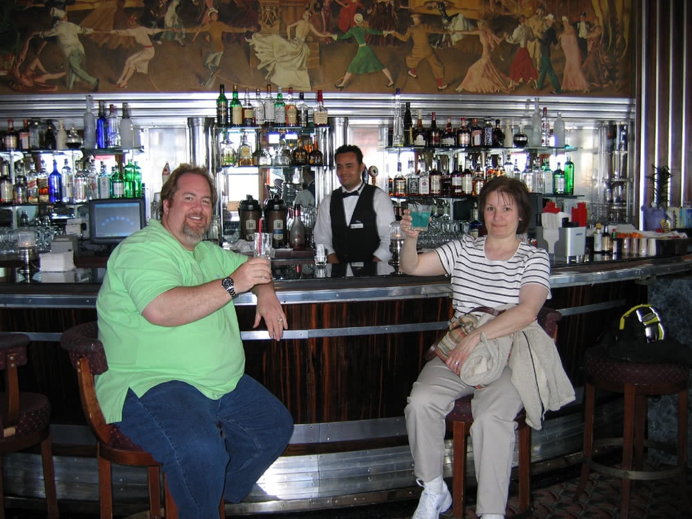 Jim and Livia toast in the Observation Lounge